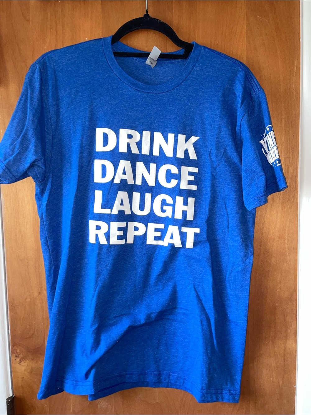 Next Level Apparel Royal Blue Tee with White Text - "Drink Dance Laugh Repeat"